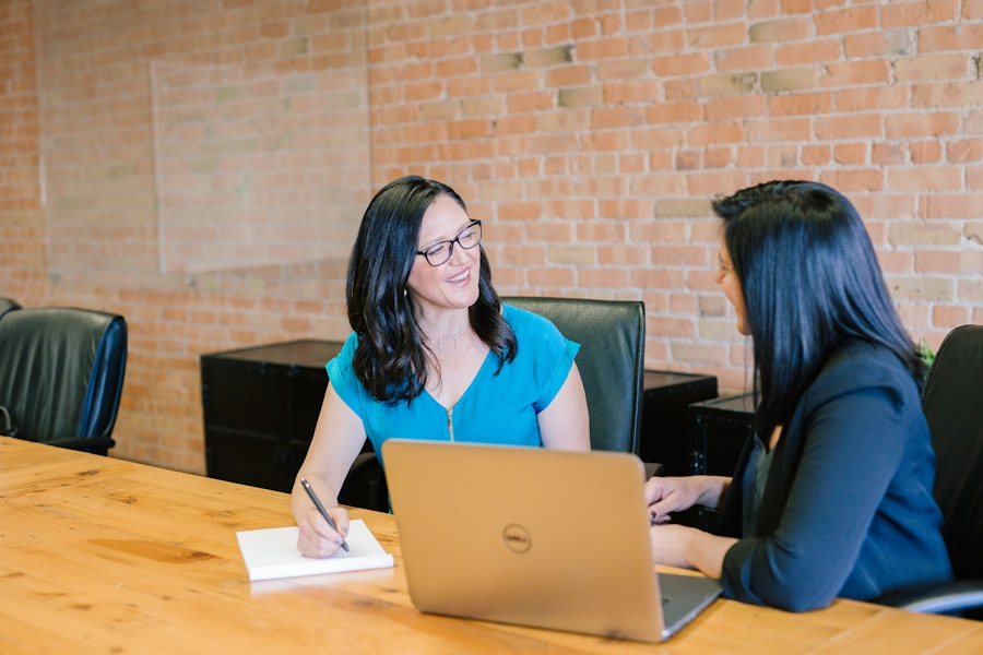 Business professionals shaking hands in a professional setting